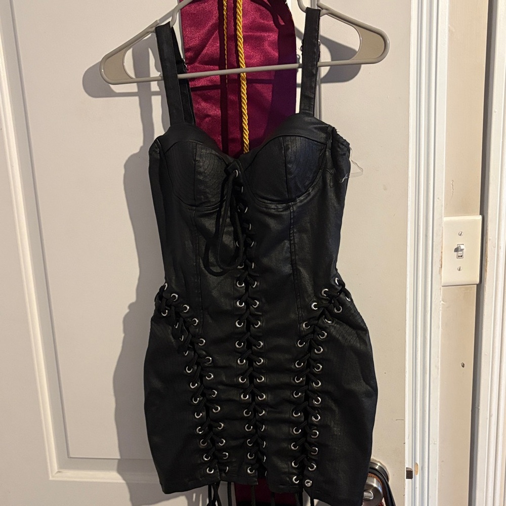 Sleek Black Lace-Up Mini Dress